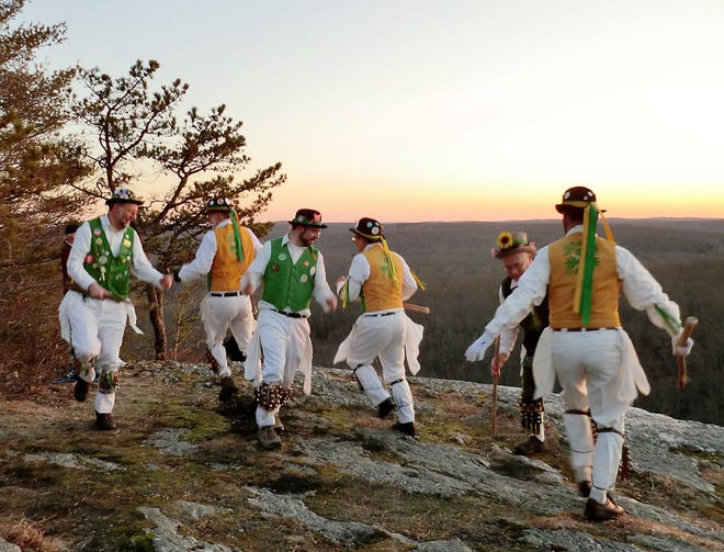 Members of the Westerly Morris Men dance Sunday, March 20, 2011 to celebrate the dawn of the Vernal Equinox.