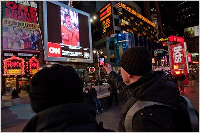 A video that showed a man controlling a screen in Times Square with his phone turned out to be a hoax.