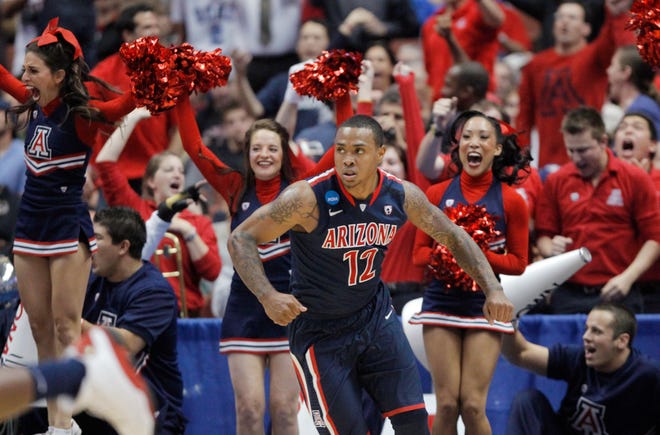 Arizona's Lamont Jones reacts after scoring a basket against Duke. The Wildcats routed the defending national champs to reach the Elite Eight.