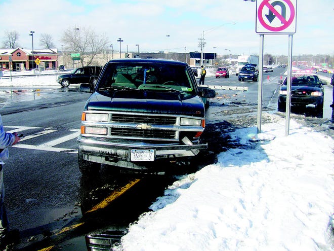 A pickup truck was heavily damaged after he was involved in a three-vehicle crash at the intersection of Eastern Boulevard and Booth Street in Canandaigua at about 9:30 a.m. Thursday.