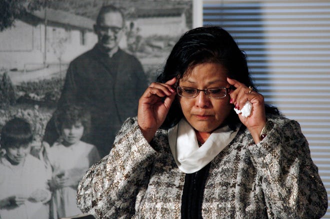 Clarita Vargas, of the Colville Tribe, speaks, during a news conference, about her experience and how her two sisters and sister-in-law were abused, Friday, March 25, 2011 in Seattle. In one of the largest settlements in the Catholic church's sweeping sex abuse scandal, an order of priests agreed Friday to pay $166.1 million to hundreds of Native Americans and Alaska Natives who were abused at the order's schools around the Pacific Northwest. (AP Photo/The Seattle Times, Courtney Blethen Riffkin)