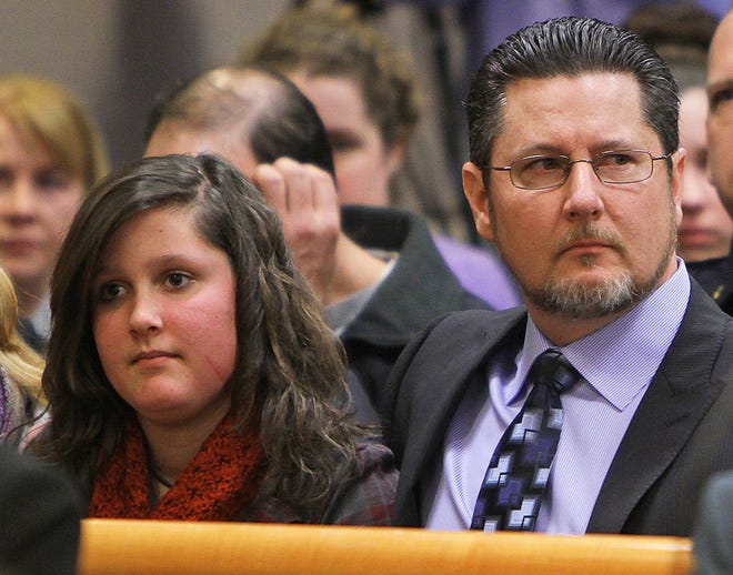 Jaimie Cates and her father, David Cates, sit in Hillsboro County Superior Court, after the sentencing of Christopher Gribble today.