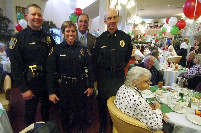 John Huff/Staff photographer 
From the left, Dover Mounted Patrol Officers Joe Caproni and Michelle Murch, and Police Chief Tony Colarusso and Capt. Michael Raiche, attend a Mounted Patrol fundraising dinner Wednesday at the Maple Suites retirement home in Dover.