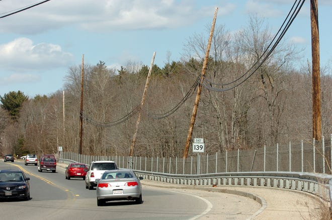 Leaning utility poles can be seen on Route 139 in Stoughton.