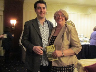 Trudy Cullen is happy to be escorted to the Arc event by her son, Brendan.