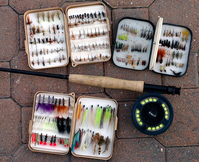 This is the 6 weight I use for trout. It also doubles for bass and occationally saltwater use with a different reel. The flies are what I use for trout. This is a collection that I have built up over many years. To get started a half dozen of the right flies will do. Souza Photo 3.25.11