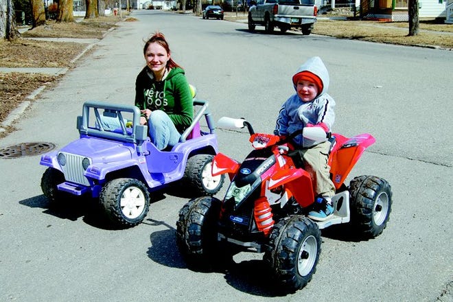 Landin LaLonde and his mom, Chastina Fish, were lined up on a random starting line at the end of Horne Street in Cheboygan. They prepared to race home for Landin’s nap on Tuesday afternoon after enjoying sunny skies and warmer temperatures.