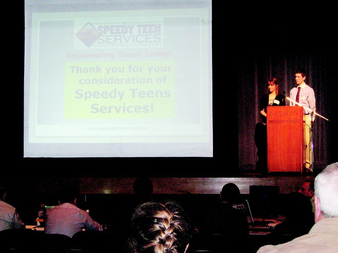 Bloomfield High students Allison Bell and Jerrett Riker make their pitch for "Speedy Teen Services" to the panel of investors.