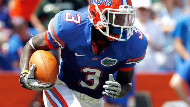 Chris Rainey runs for yardage during a game against the South Florida Bulls at Ben Hill Griffin Stadium on Sept. 11, 2010 in Gainesville.