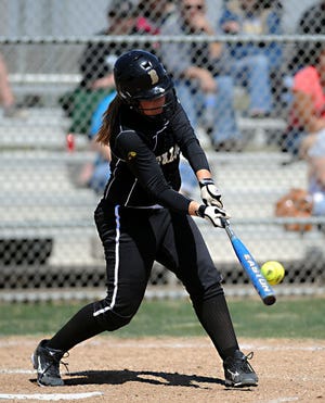 Bushland's Bailey Trimmell drives the ball for a three-run double in the fourth inning as the Lady Falcons beat Childress, 10-0, on Saturday at Bushland. The game was the District 1-2A opener for both teams.