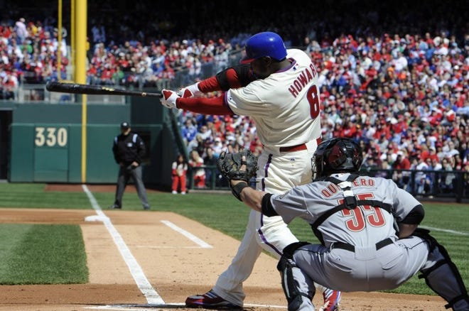 Ryan Howard follows through on a three-run home run against the Houston Astros in the first inning of Sunday's game in Philadelphia.