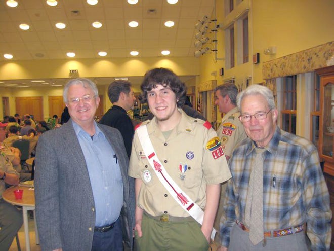 Conor Woods flanked by mentors/advisers Robert Jackman, left, and Dr. Robert Goodell, an Eagle Scout himself, at Woods’ Eagle Scout ceremony, which was held March 11, 2011, at the Marshfield Senior Center.