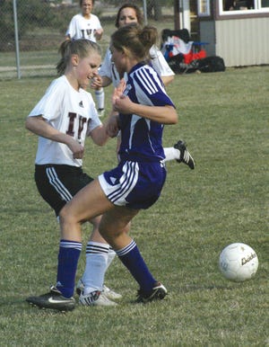 Isabella Beck tries to take the ball from a defender and make a move Thursday.