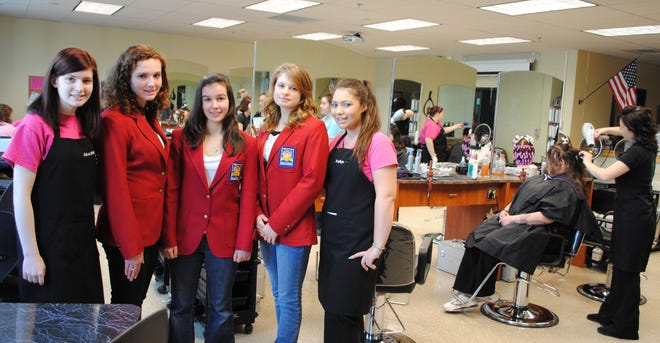 Blackstone Valley Regional Vocational Technical High School students, from left, senior Alicia Halacy of Douglas, junior Beth Belanger of Northbridge, junior Mollie Letendre of Hopedale, junior Melissa Burdick of Northbridge and senior Kaitlyn Hogue of Grafton participated in the school's Day of Beauty event recently. Belanger, Letendre and Burdick are members of the school's SkillsUSA Community Service Team that organized the event. Cosmetology students Halacy and Hogue worked the event.