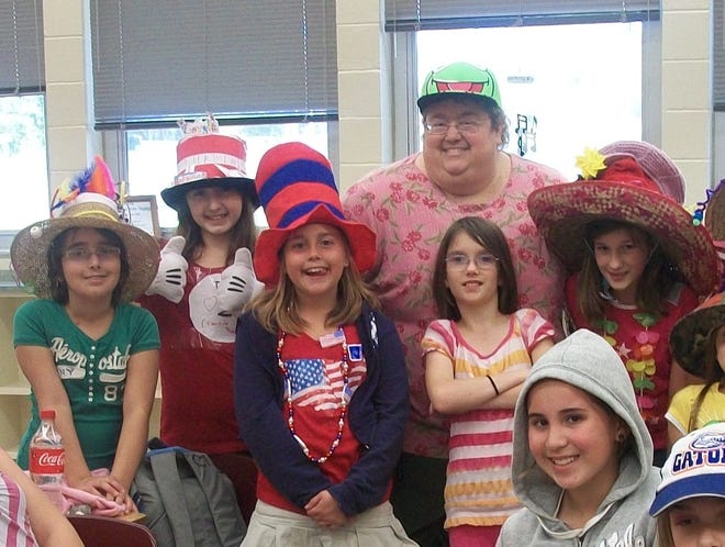 Callahan Intermediate School chorus members with chorus director Mary Ann Salis on Dr. Seuss Wacky Hat Day.