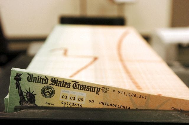 AP file photo

In 2005, trays of printed Social Security checks wait to be mailed from the U.S. Treasury's Financial Management services facility in Philadelphia.
