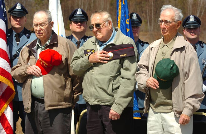 Three local Iwo Jima survivors from left: Harlan Jeffery, Hingham, Sammy Bernstein, Randolph and Kris Apostol, Norwell, were honored as part of Caddy Day Memorial Service held at Caddy Park in Quincy, Sunday, April 10, 2011.