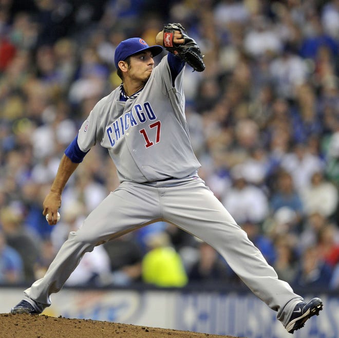 Chicago Cubs' Matt Garza pitches against the Milwaukee Brewers during the first inning of a baseball game Saturday, April 9, 2011, in Milwaukee.