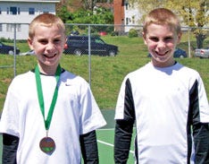 Pictured are Kolton and Kevin Reedy who finished No. 1 and No. 2, respectively, in boys’ singles.