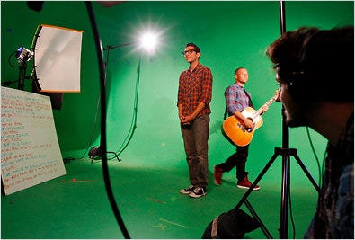 Kassem Gharaibeh, left, during the filming of a video at Maker Studios in Culver City, Calif.