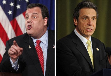 A new poll finds N.J. Gov. Christie, left, is not as popular in his home state as N.Y. Gov. Cuomo. (AP File Photos)