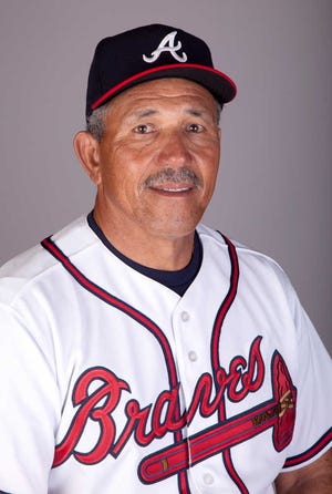 FILE -- This Feb. 21, 2011 file photo shows Atlanta Braves minor league manager Luis Salazar. Salazar has lost an eye after he was struck in the face by a line drive while watching a spring training game. Braves general manager Frank Wren said Wednesday, March 16, 2011, that doctors were unable to save Salazar's left eye after the accident March 9.  (AP Photo/David J. Phillip, File)
