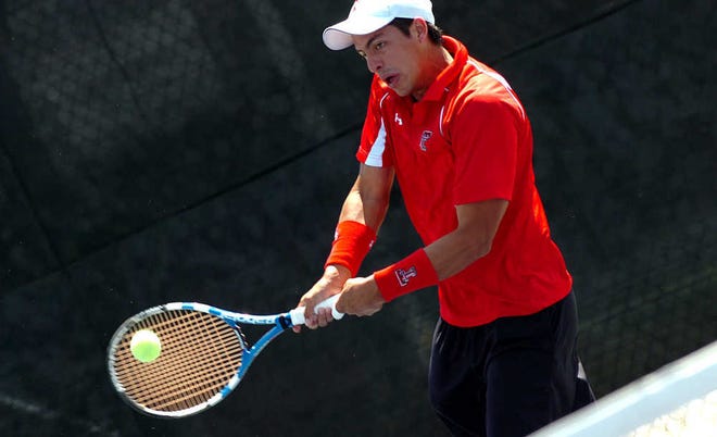 Texas Tech's Gonzalo Escobar returns a serve to a Baylor player during a match last month at the McLeod Tennis Center.