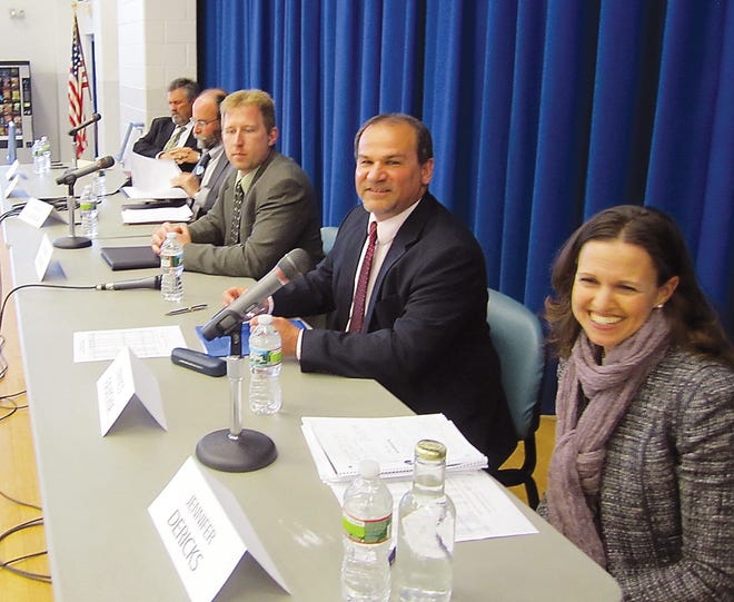 Photo by Steven Reilly/New Jersey Herald 
Sparta Board of Education candidates, from left, Scott Turner, Phillip Guarraia (i), Rich Bladek, Frank Favichia and Jennifer Dericks (i)  participated in a debate Saturday at Sparta Middle School. Five of the six candidates attended, with only incumbent board member Adam Dempsey absent. School board elections are April 27.