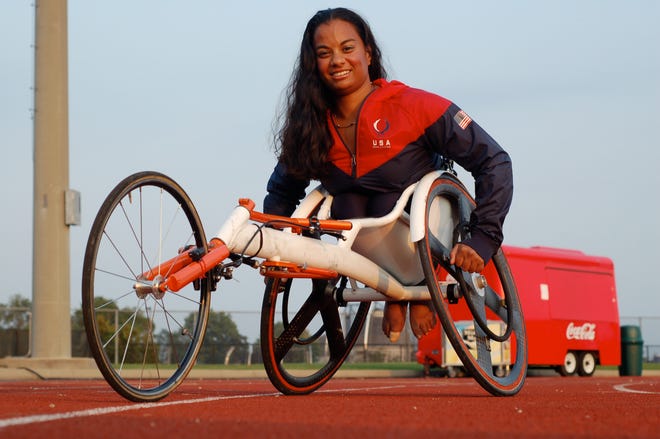 Elite wheelchair racer Anjali Forber-Pratt grew up in Natick and is returning home to take part in the Boston Marathon for the first time.