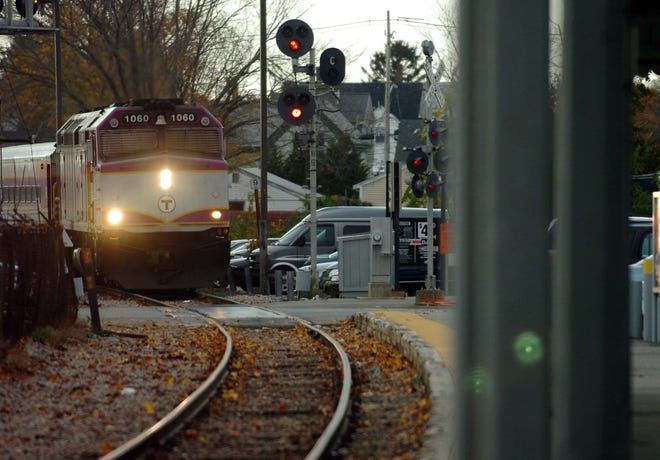 An MBTA commuter train enters the Stoughton train station recently.