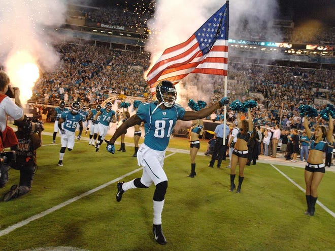 The Jaguars' Kassim Osgood runs out on the field before the start the Titans-Jaguars game at EverBank Field in Jacksonville on Monday, Oct. 18, 2010. The Jaguars had one prime-time home game in 2010, and are scheduled to have two in 2011.