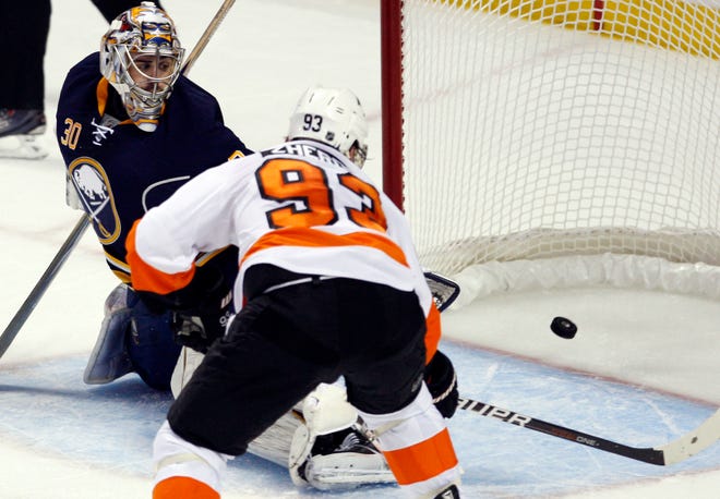 Philadelphia Flyers' Nikolay Zherdev (93) of Ukraine, scores on Buffalo Sabres goalie Ryan Miller during the second period in Game 3 of a first-round NHL Stanley Cup playoffs hockey series, in Buffalo, N.Y., Monday, April 18, 2011. The Flyers won 4-2. (AP Photo/Devin Duprey)
