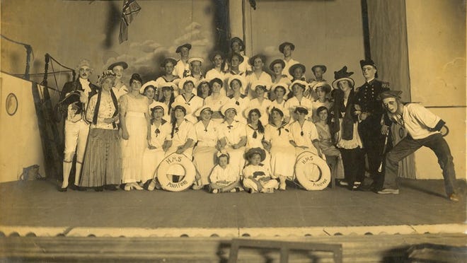 FROM THE ARCHIVES: In 1939, a then-well-established troupe of Palm Beach singers and musicians known as the Romany Chorus and Orchestra performed H.M.S. Pinafore at the Bath & Tennis Club, where, for the stage, the group built a small ship in the upper pool area. Guest singers included Metropolitan Opera star Norman Cordon and baritone John Charles Thomas, who made his entrance rowing a small boat as captain of the Pinafore. The Romany Chorus was founded in 1928 by Palm Beach mover-and-shaker Margaret Dobyne, who largely shaped the Romany fraternal ideal: You weren’t just a member of a musical group, but a member of a ‘tribe.’ Members wore gypsy garb — folk dresses, billowy shirts and sashes — to rehearsals and meetings. Dobyne’s son-in-law — Thomas, who rowed his way into the H.M.S. Pinafore performance — helped form and train the choir. The Romanies, as they were known, made their debut in Phipps Plaza, performing around a big iron kettle above a fire. There were 20 original members, but by 1930, the Romanies had doubled in size and boasted its first director, Robert Frederick Freund, chorus master at West Palm Beach’s Holy Trinity Church. Soon an orchestra was under development and, in 1931, the Romanies performed the opera I Pagliacci at the Everglades Club and in West Palm Beach, staging what many believed was the first major production of the opera in Florida. The Romanies, including a junior group known as the Romany Tads, remained active — performing at clubs, the Society of the Four Arts, the Paramount Theater and many other venues — through 1942 and its membership eventually grew to more than 100. With the advent of World War II, the Romanies lost many male voices and instrumentalists so it wasn’t feasible to hold the group together. Later revival efforts floundered, but the Romany pledge still echoes: “I hereby pledge myself to Romany principles — faith, loyalty and sincerity to the tribe ... I join for the love of music and the joy of singing ... I promise to be ever mindful of the Romany motto — ‘one for all and all for Romany.’ — M.M. CLOUTIER