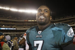 FILE - In this Nov. 21, 2010, file photo, Philadelphia Eagles quarterback Michael Vick smiling as he leaves the field after an NFL football game against the New York Giants in Philadelphia. Asked after practice Friday, Dec. 24, 2010, who he would select as the NFL's MVP if he had a vote, Vick said, "You put me on the spot." Then he added with a smile: "I would take ... myself." (AP Photo/Matt Slocum, File)