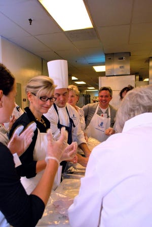 Students learn in the Salt restaurant kitchen during the Salt Cooking School last year at The Ritz-Carlton, Amelia Island.