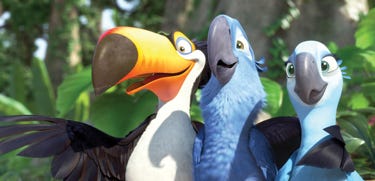 From left, Raphael, voiced by George Lopez, Blu, voiced by Jesse Eisenberg, and Jewel, voiced by Anne Hathaway, shown in a scene from "Rio."