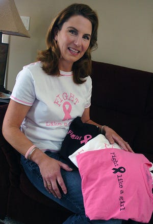 Nancy Longobardi, 42 of Franklin, overcame breast cancer eight years ago, and has now started to make breast cancer shirts and sweatshirts with proceeds going to Beth Israel Deaconess Medical BreastCare Center in Boston.