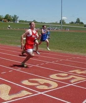 Dan Enright won the 100-Meter Dash during a quad-meet at Victor High School in 2001 in 11.5 seconds.