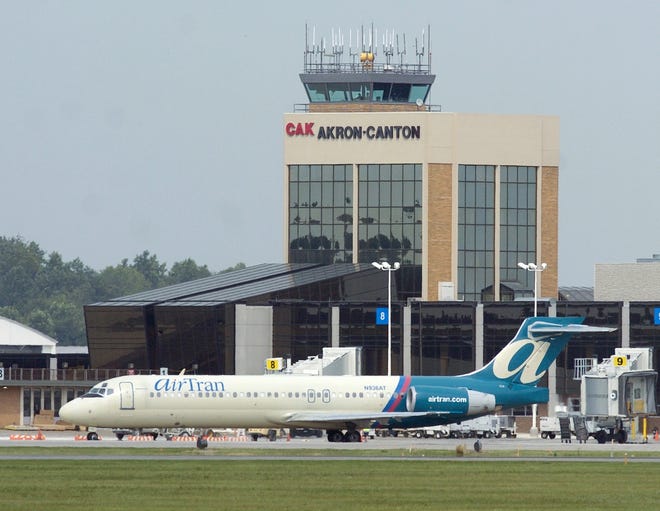 An AirTran flight en route to Boston departs the gate at the Akron-Canton Regional Airport.