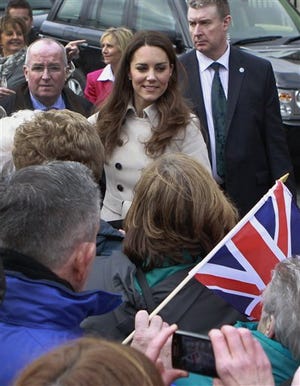 Kate Middleton talks to members of the public March 8, 2011, as she leaves Hillsborough Castle in Belfast, Northern Ireland.