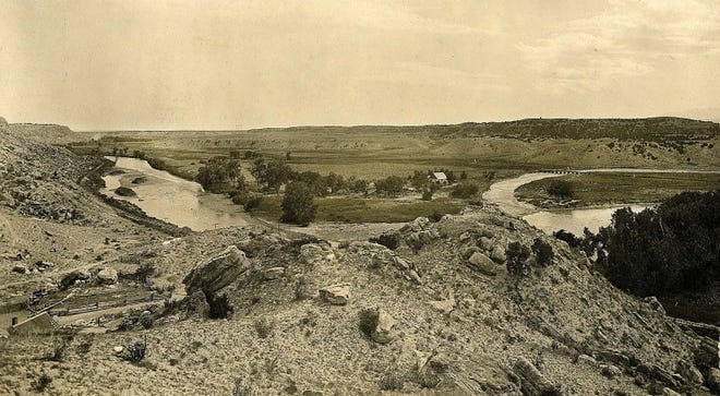 This view shows the McBride property looking south across the Arkansas River. The buildings are gone but a trail along an old railroad right-of-way leads to the property that abuts Red Creek.