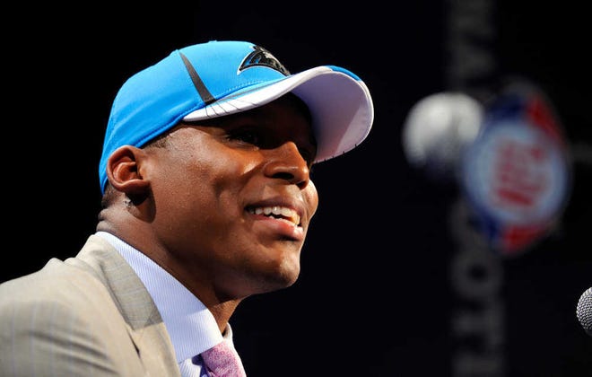 Quarterback Cam Newton was selected first overall in the NFL draft by the Carolina Panthers on Thursday in New York.