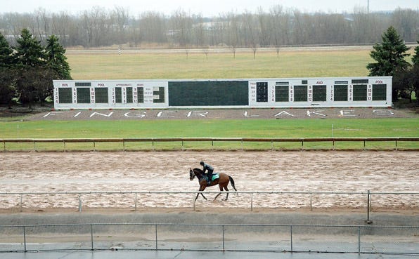 2004 New York Derby winner Dean Frates works out a horse at Finger Lakes on Wednesday, April 13 in preparation for the season opener this Saturday.