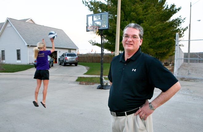 The city received six complaints about Greg Gietl's basketball hoop last week, even though it's been in the same spot on his cul-de-sac for six years. His daughter, Kassidy, shot baskets there Sunday. 
Rich Saal/The State Journal-Register