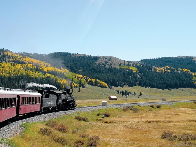 SHNS photo by Linda Lange / Knoxville News-Sentinel 
Under piercing blue skies, the Cumbres & Toltec Scenic Railroad’s steam locomotive rumbles through 
ranchland, steep gorges and sagebrush desert.