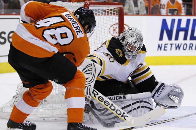 Goaltender Tim Thomas (right), shown making a save against Danny Briere and the Flyers on Saturday, gives the Bruins a big edge over Philadelphia in their second-round playoff series.