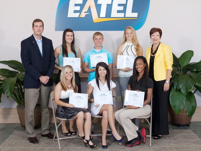 From left, back row: Ashley Phillips, EATEL’s vice president of Network Operations and Engineering; Megan Delatte, Caleb Alexander, Kaitlin McClure, Patrice Pujol, superintendent Ascension Parish Public Schools; and front row: Victoria Hunt, Courtney Aydell, and Mikala Batiste.