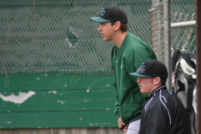 Weed Cougar head coach Josh Oates encourages his players during the first game of a doubleheader April 15, 2011 at Son's Park in Weed. The Cougars lost 17-0 then beat the Bears for the first time in more than a dozen years 4-3 in game two.