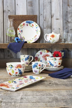 Sur la Table's Botanical dishware collection features a happy, modern floral pattern on snowy white, dishwasher-safe ceramic.