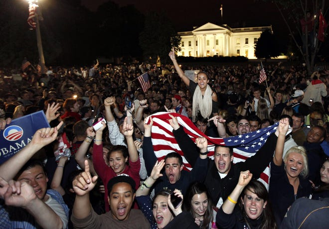 Crowds gathers outside the White House in Washington early Monday, May 2, 2011, to celebrate after President Barack Obama announced the death of Osama bin Laden. (AP Photo/Manuel Balce Ceneta)
